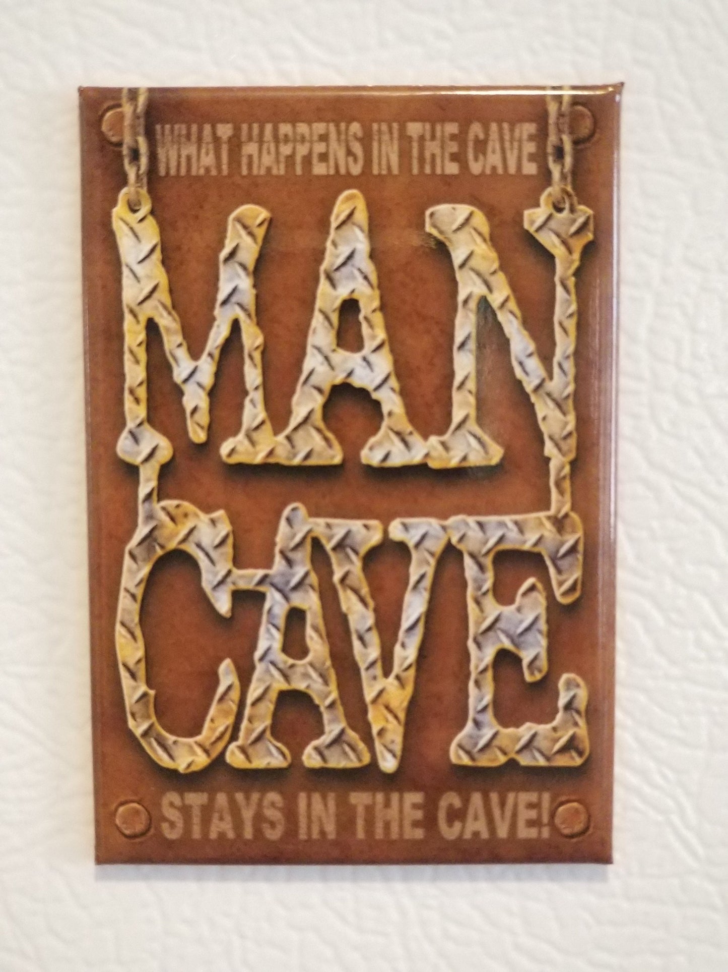 Man Cave,What Happened In The Cave Stays In The Cave on a 2x3 Refrigerator Magnet with Glossy Finish.A Funny Gift For Mom or Dad.