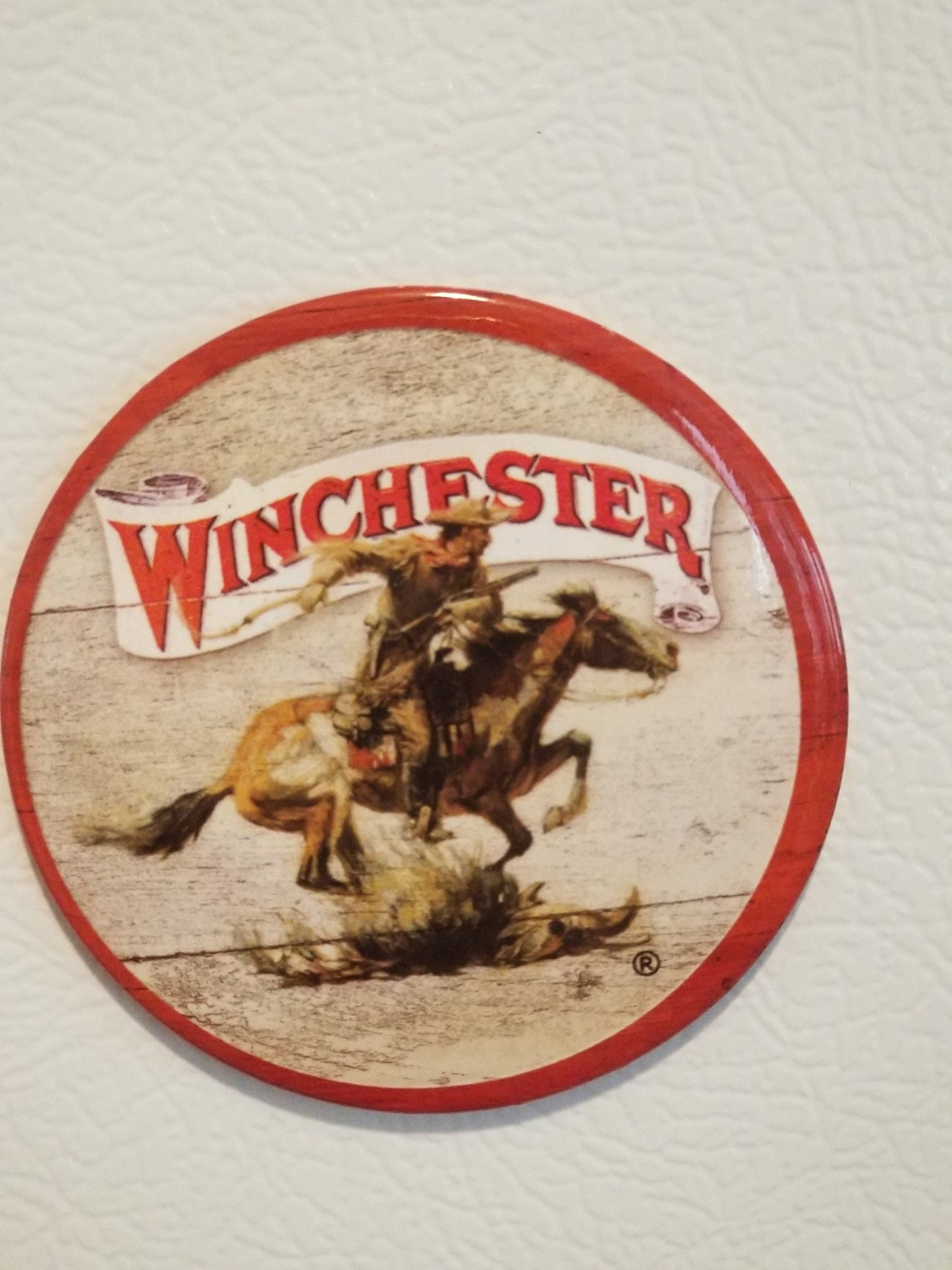 Winchester A Must Have Tool During The Wild West on a 3” Diameter Magnet with Glossy Finish.Quality Steel Construction.