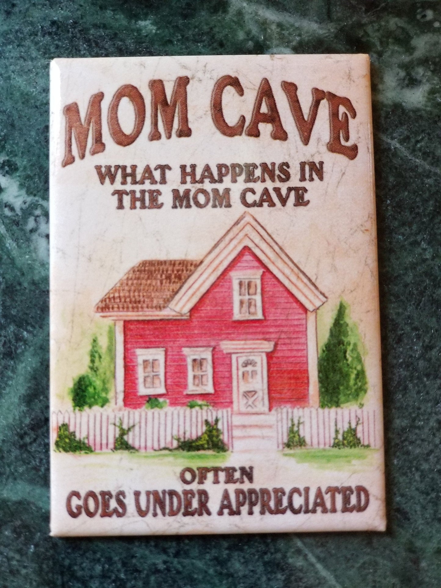 Mom Cave,What Happens in The Mom Cave on a 2x3 Refrigerator Magnet with Glossy Finish.