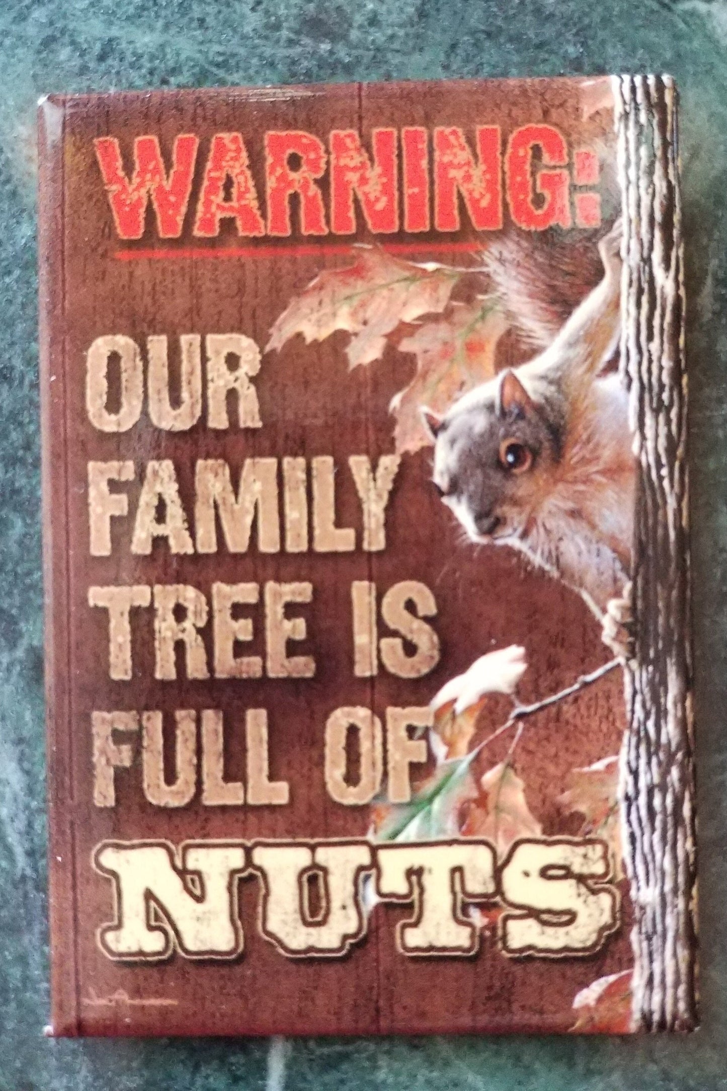 Warning Our Family Tree Is Full of Nuts on a 2x3 Refrigerator Magnet with Glossy Finish.Quality steel construction