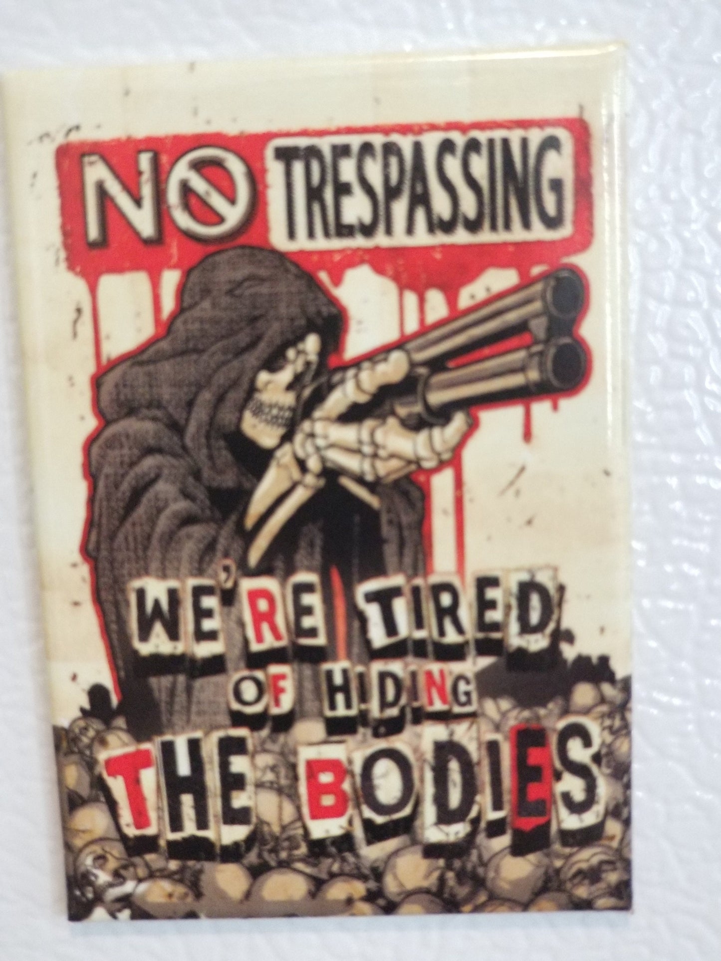 No Trespassing We Are Tired of Hiding The Bodies on a 2x3 Refrigerator Magnet with Glossy Finish.Quality steel construction