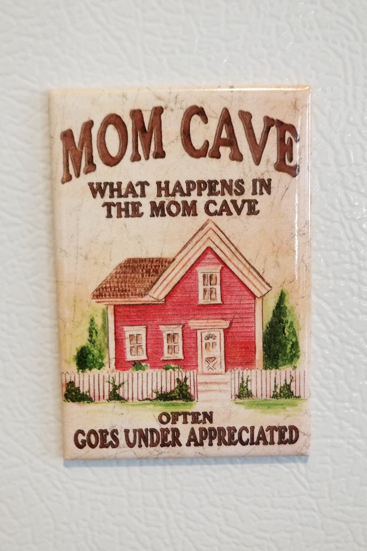 Mom Cave,What Happens in The Mom Cave on a 2x3 Refrigerator Magnet with Glossy Finish.