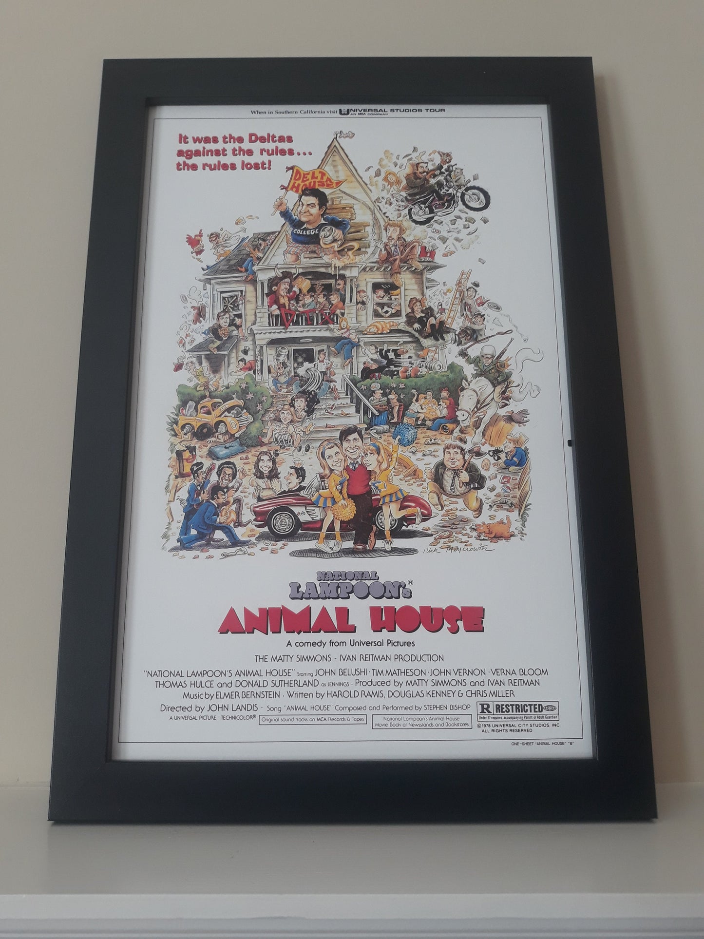 National Lampoons Animal House on a Unframed 11x17 Poster. Memories of The Delta House With This Iconic Poster.