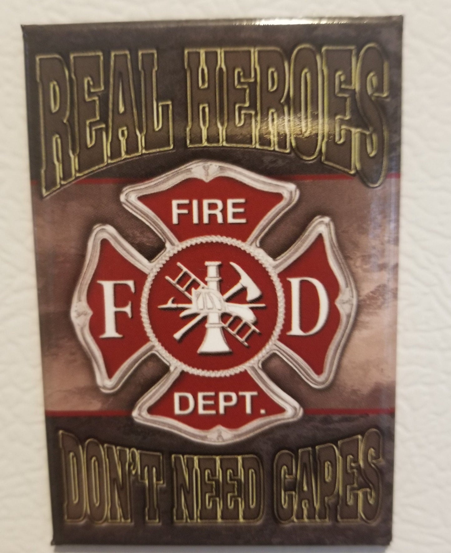 Real Heroes Don’t Need Capes, Fire  Department on a 2x3 Refrigerator Magnet with Glossy Finish.Quality steel construction