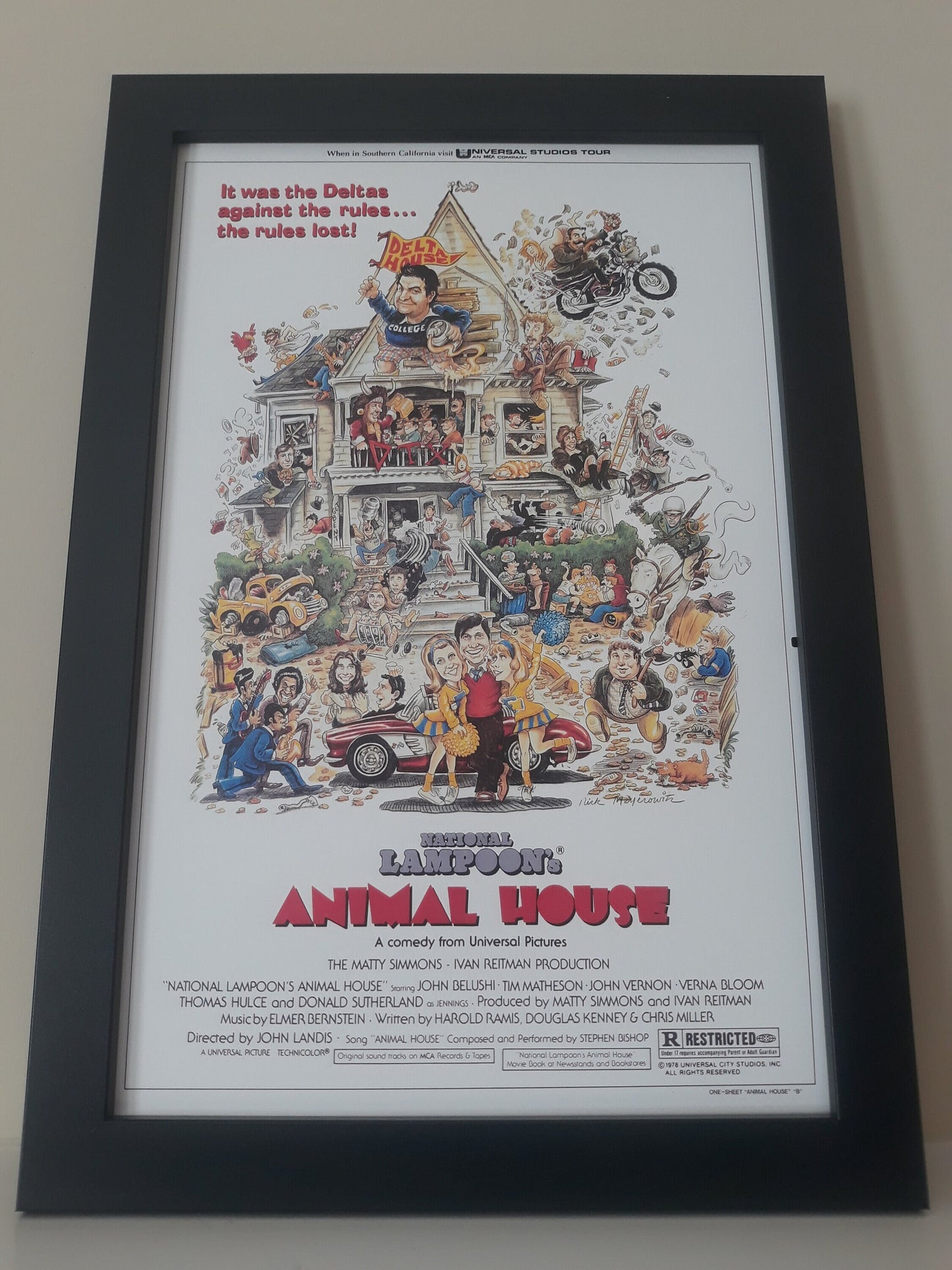 National Lampoons Animal House on a Unframed 11x17 Poster. Memories of The Delta House With This Iconic Poster.