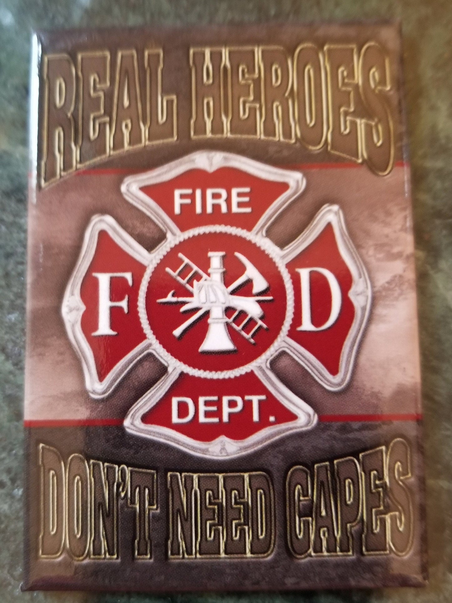 Real Heroes Don’t Need Capes, Fire  Department on a 2x3 Refrigerator Magnet with Glossy Finish.Quality steel construction