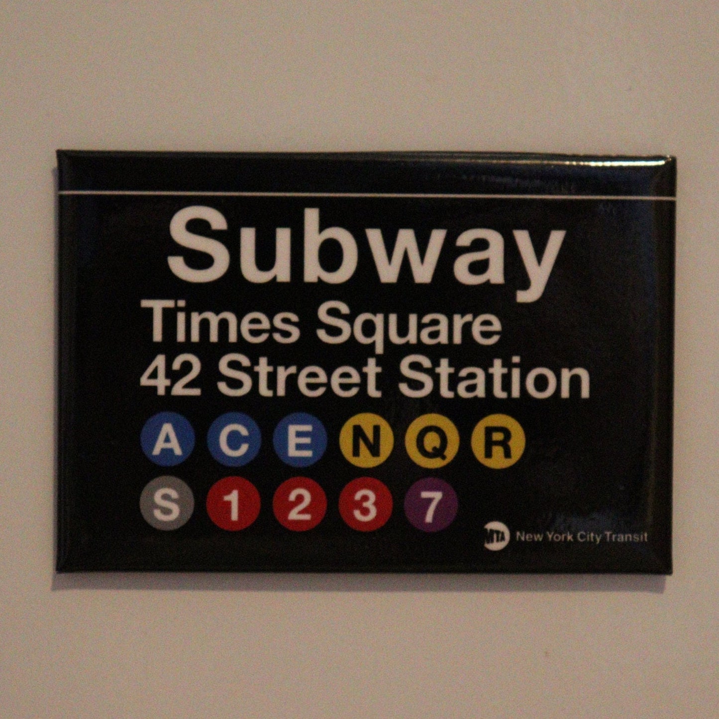 Times Square 42nd Street Replica Subway Sign on a 2x3 Refrigerator Magnet.Metal Construction Glossy Finish. MTA Officially Licensed product.