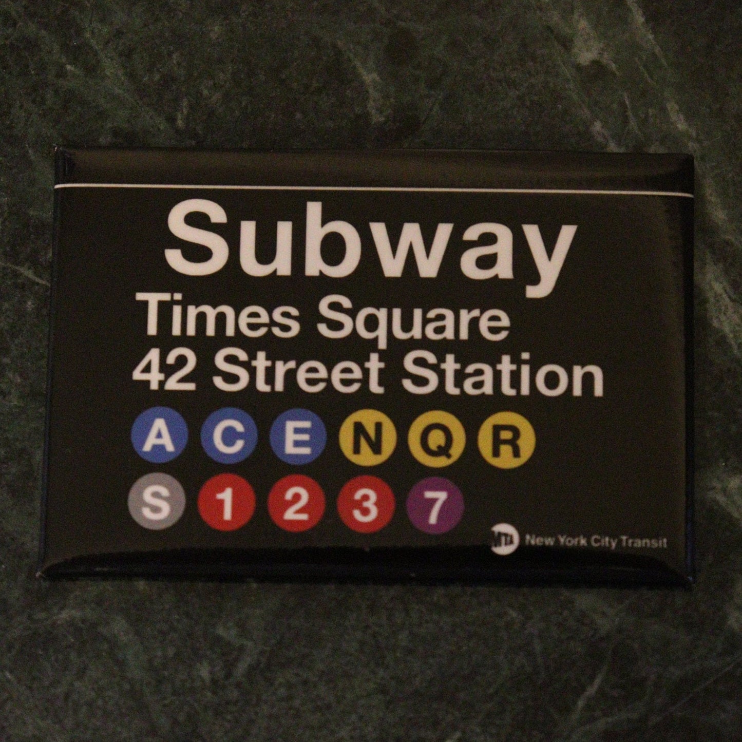 Times Square 42nd Street Replica Subway Sign on a 2x3 Refrigerator Magnet.Metal Construction Glossy Finish. MTA Officially Licensed product.