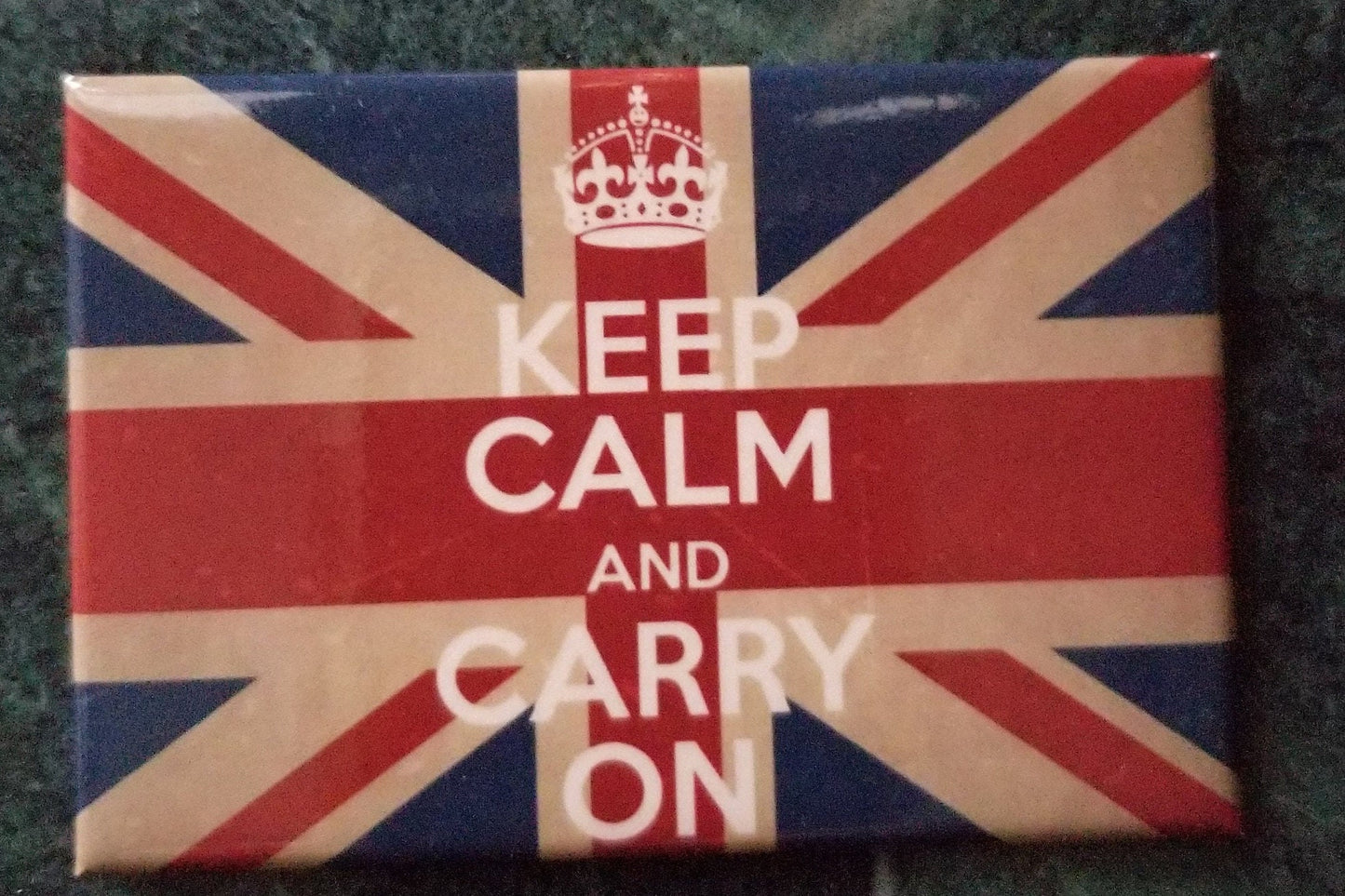 Keep Calm And Carry On,Words of Wisdom From Our British Friends on a 2x3 Steel Refrigerator Magnet with Glossy Finish.A Gift For Him or Her.