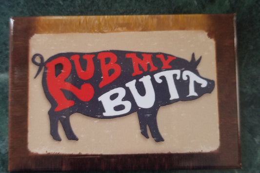 Rub My Butt on a 2x3 Refrigerator Magnet with Glossy Finish. Steel construction with strong magnet holding power. Gift For Him or Her.A