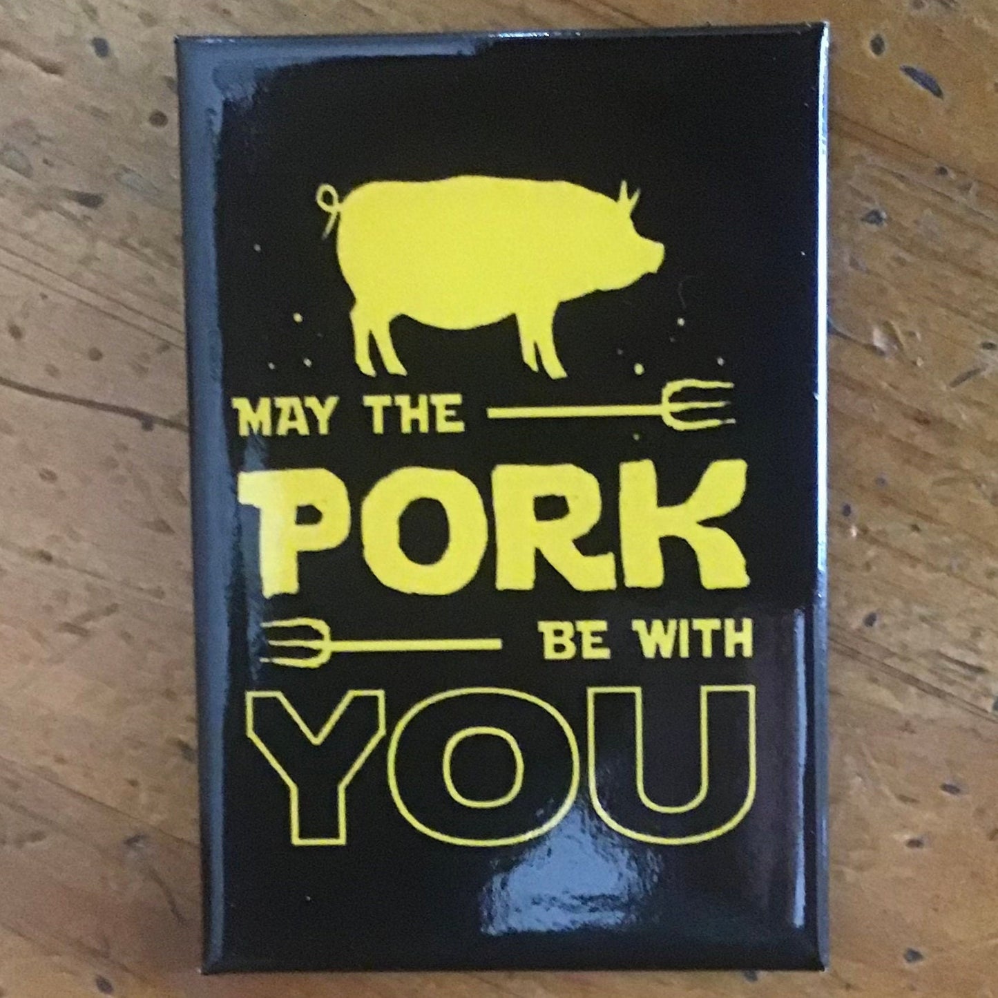 May The Pork Be With You on a 2x3 Magnet with Glossy Finish and Metal Construction. A Gift For Him or Her.